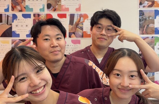 学園の森オレンジ整骨院の外観とスタッフ